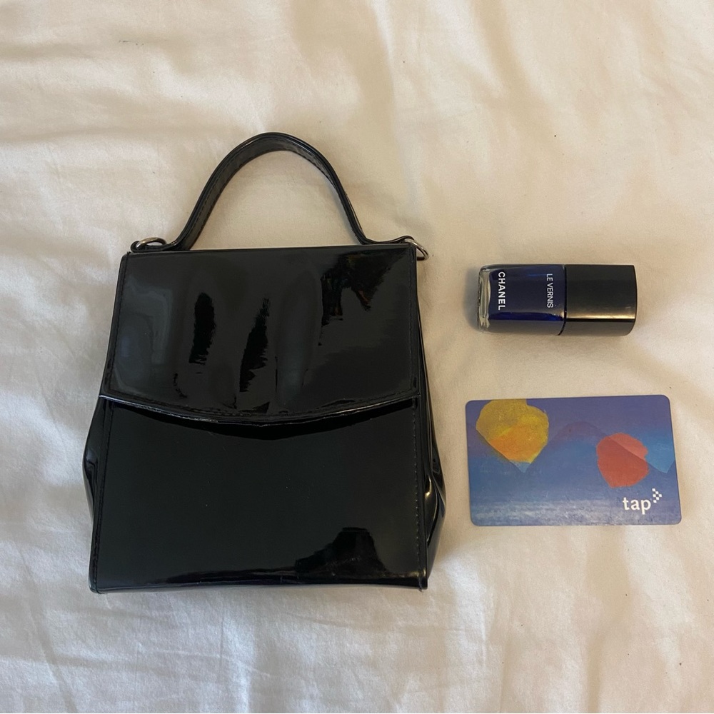 tiny black patent leather bag
